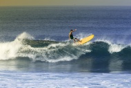 Indonesia, Bali, man surfing ...