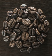 Coffee beans on wooden backgr...