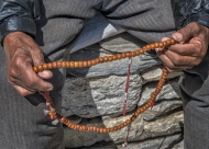 Nepal, Khumbu, man holding pr...