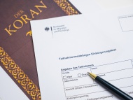 Koran and German document for...