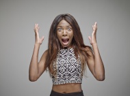 Portrait of horrified woman i...