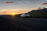 Iceland, car on road under mi...