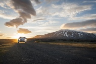 Iceland, car on gravel road u...