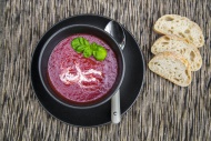 Bowl of beetroot soup, white ...