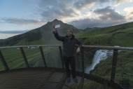 Iceland, Man taking selfie at...