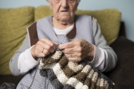 Senior woman knitting