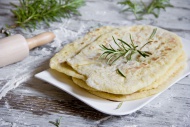 Stack of naan breads with ros...