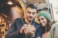 Couple looking at handmade wo...