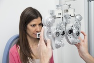 Woman at the optometrist maki...