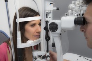Woman at the optometrist maki...