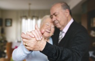 Hands of senior couple dancin...