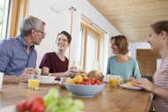 Happy family having breakfast...