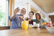 Happy family taking a selfie ...