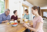 Family using portable devices...