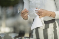 Close-up of waitress cleaning...