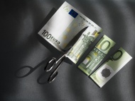 100 euro and scissors, symbol...