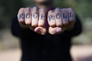 Fingers tattooed with \'Rock ...