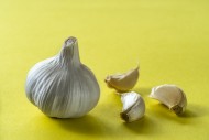 Garlic bulb and cloves on an ...