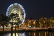 Motion blurred Ferris wheel a...