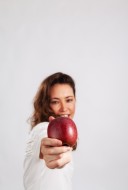 Apple in hand of a woman