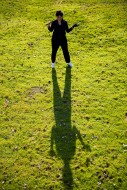 Aerial View of a Golfer Holdi...