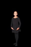 Young girl in dancewear stand...