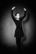 Young girl in dancewear stand...