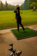 Golfer Training Her Golf Club...