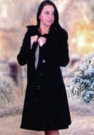 Woman in a black coat in fron...