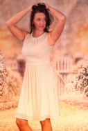 Woman in a white festive dres...