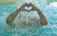 Woman Making a Heart Shape wi...