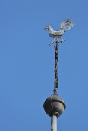 Spire with weather vane of Bu...