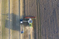 Aerial view over combine harv...