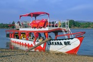 Tourists on river boat on Tsi...