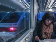Woman Travel in a Train and R...