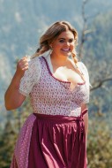 Plus-size model in front of a...