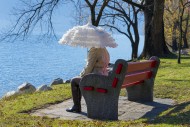 Woman with a Parasol Sitting ...