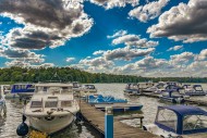 Boats on piers of a lake and ...