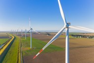 Aerial view over wind turbine...