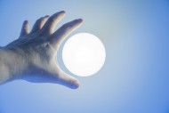 Male Hand Reaching a Illumina...