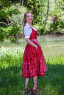 Young woman standing, turning...