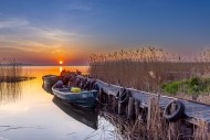 Fishing boats at wooden jetty...