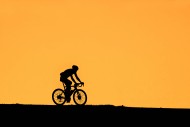 Solitary cyclist riding on hi...